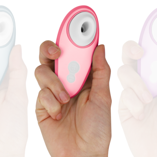 Coffret Womanizer Liberty 2 rose avec câble USB et manuel